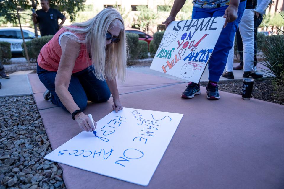 Rhonda Adams attends a rally outside the Arizona Department of Health Services in Phoenix on Sept. 26, 2023.