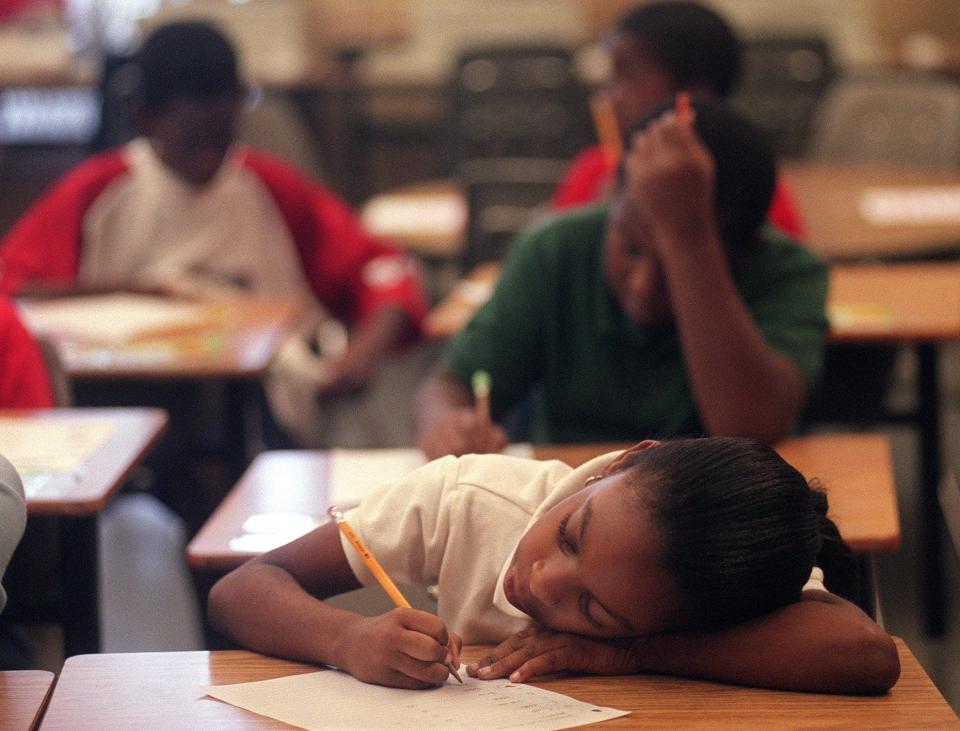 Fourth grader Lamattie Freeman takes a spelling test during class at West Riviera elementary school. STAFF FILE PHOTO/palm beach post  