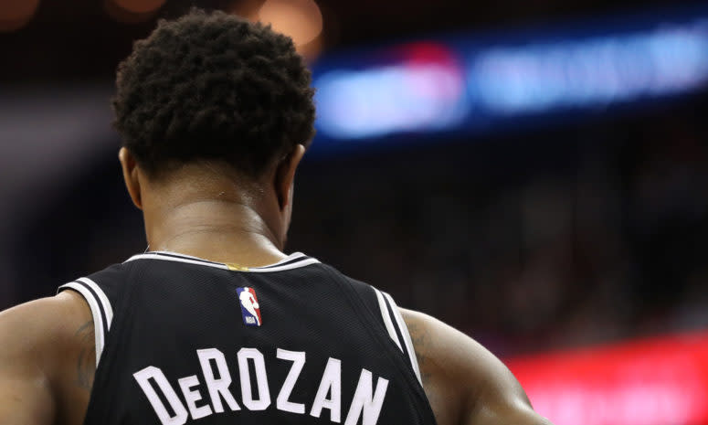 A photo of DeMar DeRozan from behind.