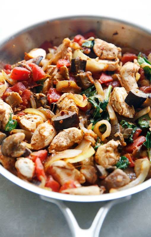 <p>Lexi's Clean Kitchen</p><p>This easy one-pan eggplant chicken dinner is packed with delicious Italian flavors, and seasonal veggies, and is customizable! Vegan? Replace the chicken with zucchini. Looking for seafood? Throw in shrimp!</p><p><strong>Get the recipe: <a href="https://lexiscleankitchen.com/easy-one-pan-eggplant-chicken-dinner/" rel="nofollow noopener" target="_blank" data-ylk="slk:One-Pan Eggplant Chicken Dinner;elm:context_link;itc:0;sec:content-canvas" class="link ">One-Pan Eggplant Chicken Dinner</a></strong></p>