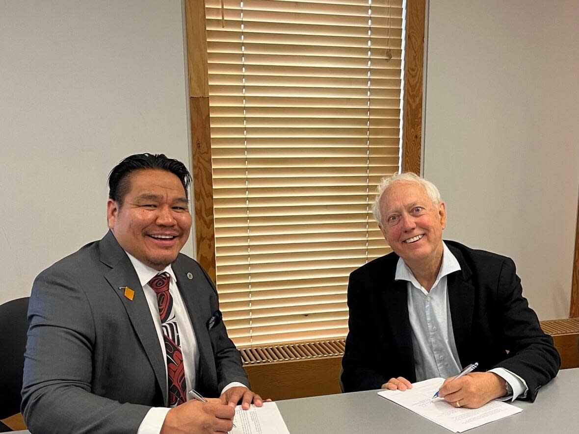 Chief Murphy Abraham of the Lake Babine Nation and Indigenous Relations and Reconciliation Minister Murray Rankin signed an agreement to return 200 square kilometres of land to the Nation. (Flickr/Government of B.C. - image credit)