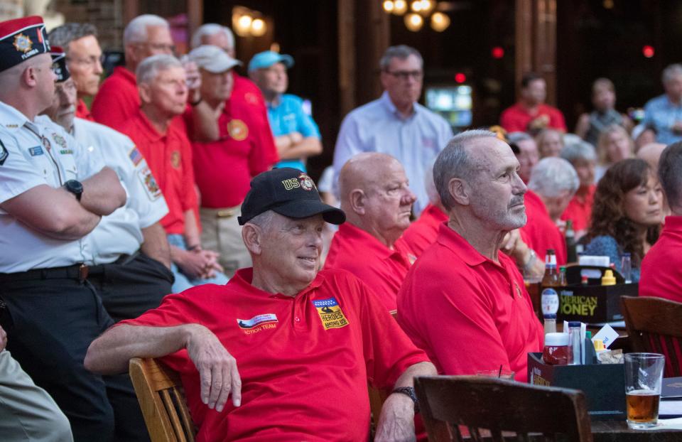 Marine Corps League members listen during their Heroes Among Us speaker series event at Seville Quarter in Pensacola on Thursday, May 26, 2022.