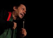 Chairman of the Pakistan Tehreek-e-Insaf (PTI) political party Imran Khan addresses his supporters during what has been dubbed a "freedom march" in Islamabad August 20, 2014. REUTERS/Faisal Mahmood/File Photo