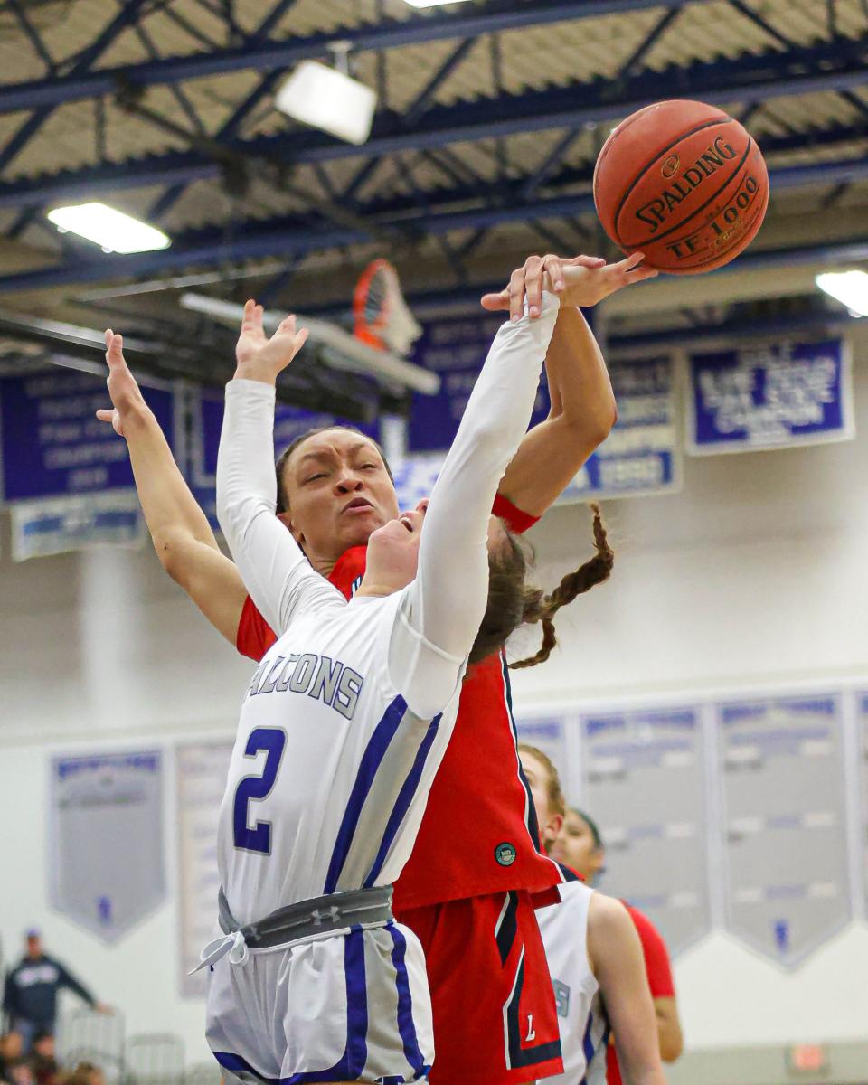 Zariyah Whigham (5) blocks the shot attempt from Megan Donley (2). The Lebanon Cedars took a short drive to south Lebanon to face the Cedar Crest Falcons in a LL League girls' basketball game on Friday, Jan. 5, 2024. The Cedars got past the Falcons 53-41.
