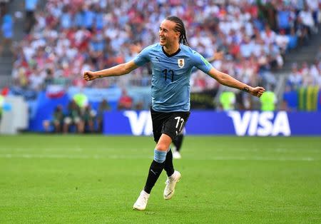 FILE PHOTO: Soccer Football - World Cup - Group A - Uruguay vs Russia - Samara Arena, Samara, Russia - June 25, 2018 Uruguay's Diego Laxalt celebrates scoring their second goal REUTERS/Dylan Martinez