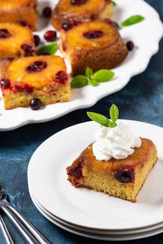 <p>The Blond Cook</p><p>With a layer of juicy pineapples and cranberries, this sheet cake has the perfect balance of sweet and tart flavors, and is a must-have dessert for your holiday table.</p><p><strong>Get the recipe:</strong> <a href="https://theblondcook.com/cranberry-pineapple-upside-down-cake/" rel="nofollow noopener" target="_blank" data-ylk="slk:Cranberry Pineapple Upside Down Cake;elm:context_link;itc:0;sec:content-canvas" class="link rapid-noclick-resp"><strong>Cranberry Pineapple Upside Down Cake</strong></a></p>