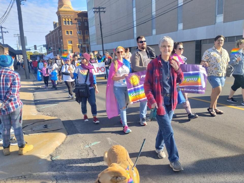 People march in the Springfield Pridefest in downtown Springfield on Oct. 8, 2022.