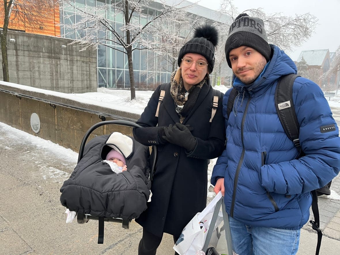 Simon Faubert and Andreea Iftemie, along with their baby. They lost power at about 4 p.m. yesterday. (Patrick Foucault/Radio-Canada - image credit)