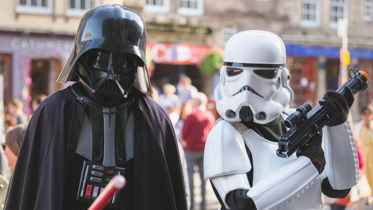 darth vader and stormtrooper at daytime parade