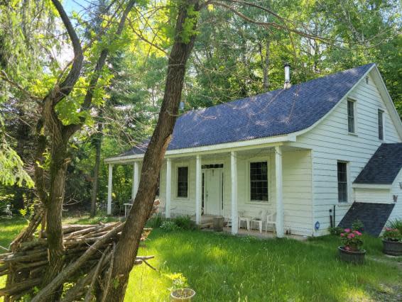 The home that burned down in a fire early Friday morning that is believed to have killed its two occupants, Sue Ellen Jones and Christopher Millar, was built in the 1840s.  (Submitted by Daniel Parkinson - image credit)