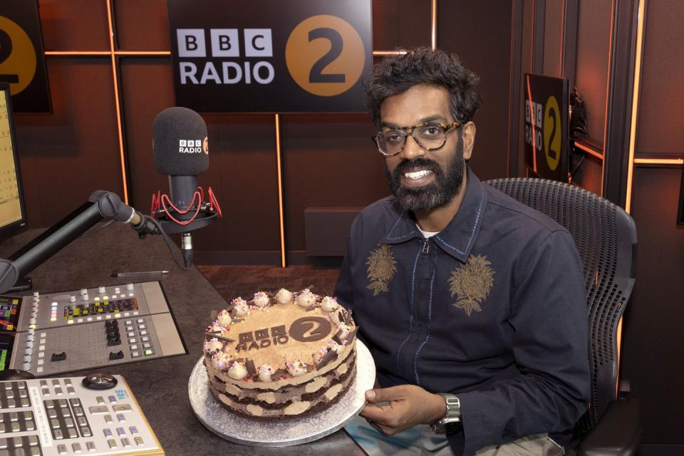 romesh ranganathan with a radio 2 cake