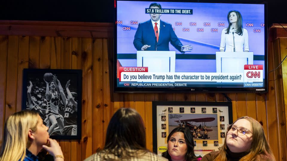 Five days until the Iowa Caucus, supporters of Nikki Haley and students gather at Buzzard Billy's to watch the Republican presidential debate between Haley and Ron DeSantis on a snowy and cold evening in Des Moines on Wednesday January 10, 2024. - Melina Mara/The Washington Post/Getty Images