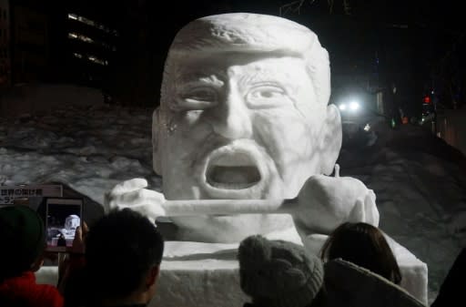 An ice sculpture of US President Donald Trump featured during the 2017 Sapporo Snow Festival, but this year organisers are having to truck-in powder from outlying areas