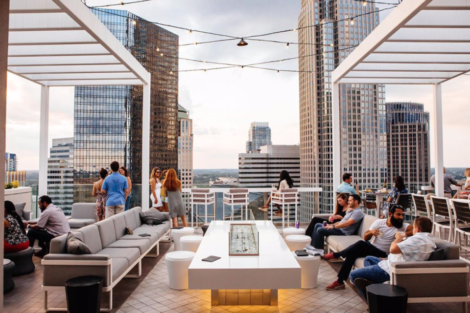 Nuvole 22’s rooftop bar is a convenient stop for cocktails and snacks close to the Spectrum Center.