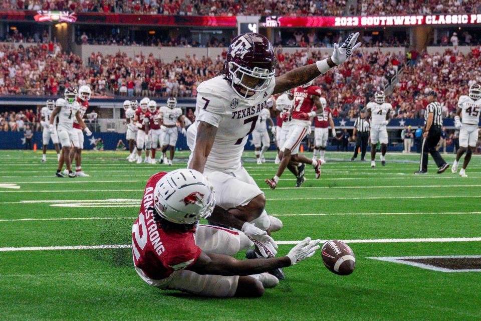 Texas A&M defensive back Tyreek Chappell breaks up a pass intended for Arkansas Razorbacks wide receiver Andrew Armstrong last season. Chappell, a cornerback, returns as a key piece of a rebuilt A&M secondary.