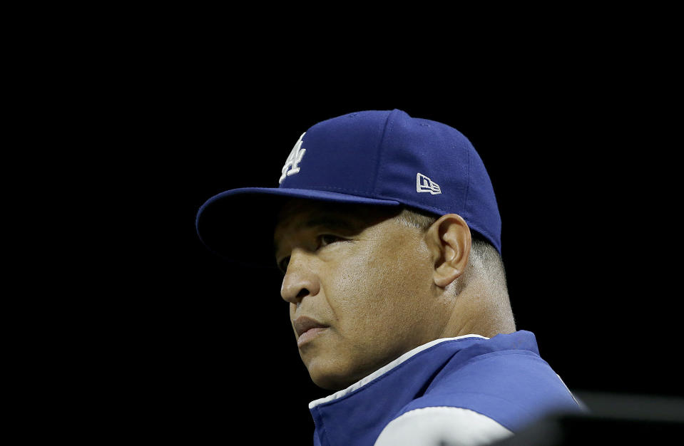 Dodgers manager Dave Roberts says he wouldn't be comfortable with a player kneeling during the national anthem. (AP)