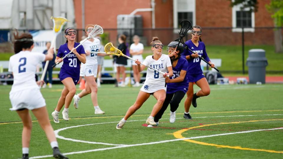 Sayre’s Anna Mullikin (8) maneuvers toward the goal through the Bowling Green defense during the 2024 Commonwealth Lacrosse League Girls State Championship at Transylvania’s Pat Deacon Stadium on Saturday. Jared Peck/jpeck@herald-leader.com