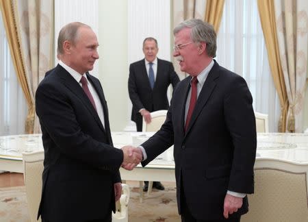 Russia's President Vladimir Putin (L) meets with U.S. National Security Adviser John Bolton in Moscow, Russia June 27, 2018. Sputnik/Alexei Druzhinin/Kremlin via REUTERS