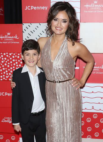 <p>Jim Spellman/Getty </p> Danica McKellar and son Draco Verta attend the New York screening of Hallmark Channel's "Christmas At Dollywood" on December 05, 2019 in New York City.