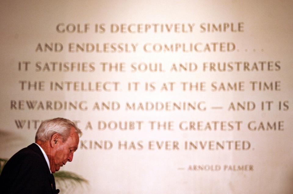 <p>PGA Hall of Fame golfer Arnold Palmer leaves a press conference prior to the World Golf Hall of Fame induction ceremony on November 2, 2009 in St Augustine, Florida. Palmer is making the induction speech for former President Dwight D. Eisenhower. (Photo by Marc Serota/Getty Images for the World Golf Hall of Fame) </p>