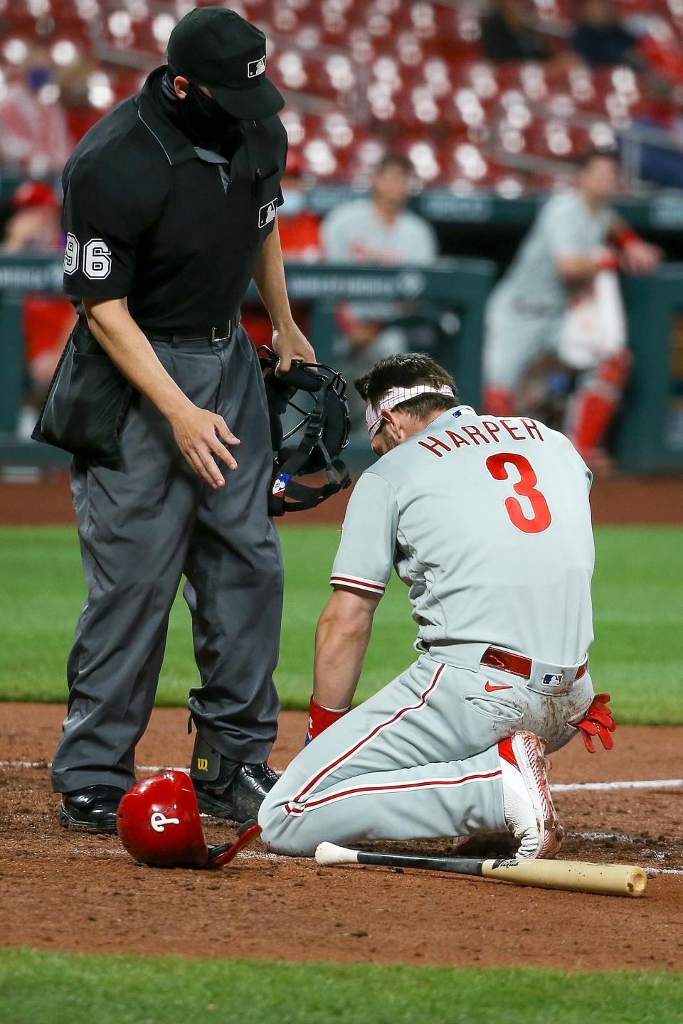 Bryce Harper reacts after getting hit in the face by a pitch on April 28.