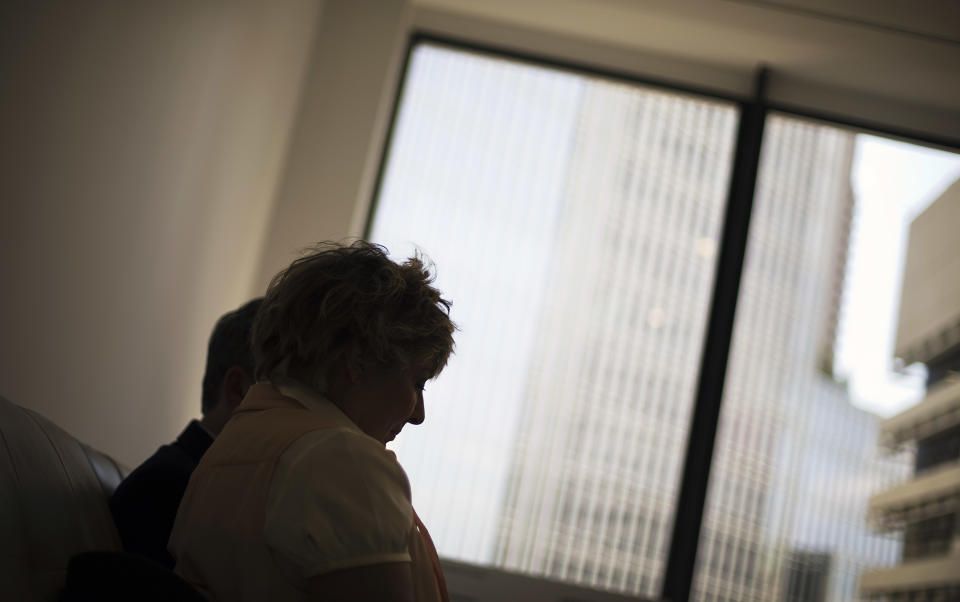 Elizabeth Jones, right, sits next to her husband Richard in their attorney's office Wednesday, April 9, 2014, in Atlanta, while talking about their daughter Sarah Jones, the 27-year-old camera assistant killed Feb. 20 by a freight train while filming a movie in southeast Georgia. Jones' parents say they’re grieving, angry and want someone held accountable for their daughter’s death. It’s been less than two months since Sarah Jones died after being struck by a train on tracks spanning the Altamaha River southwest of Savannah. She was part of a crew shooting a movie based on the life of rock singer Gregg Allman. (AP Photo/David Goldman)