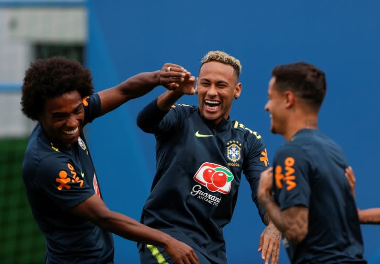 Coutinho with Willian (L) and Neymar at Brazil training on Tuesday