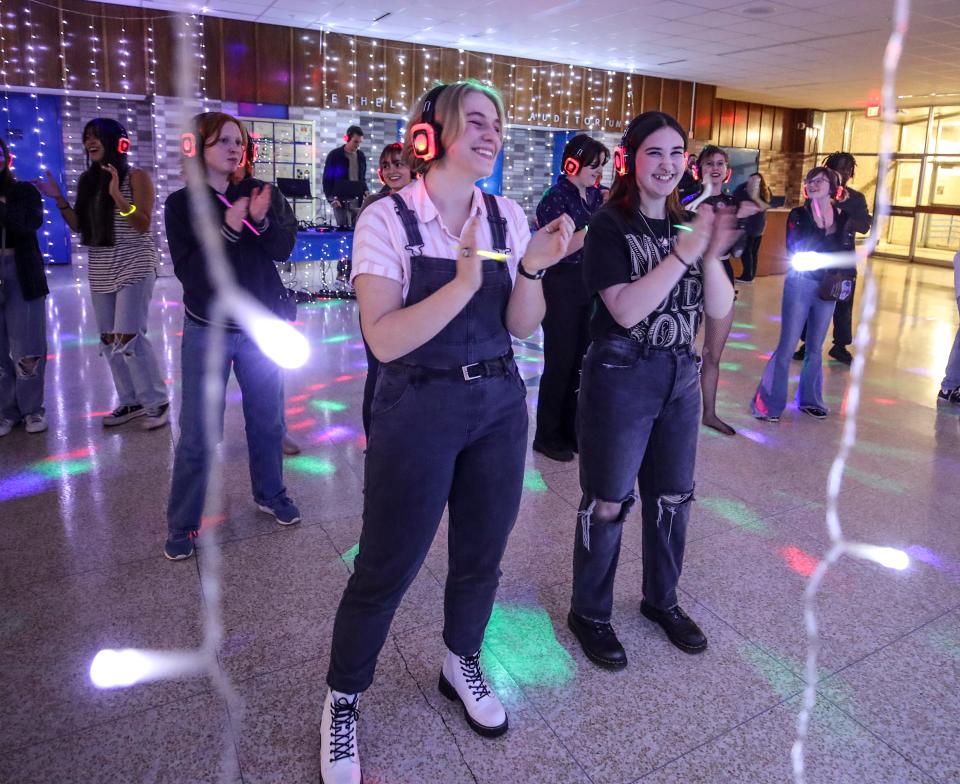 Libby Mook and Marie Wright dance during J. Graham Brown School's first silent disco.