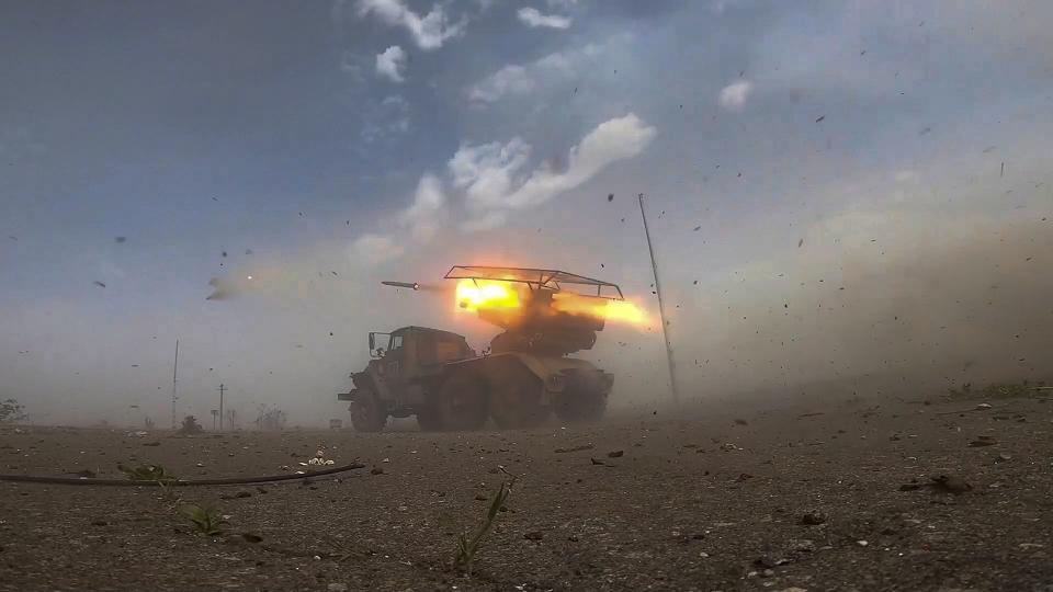 This photo taken from video released by the Russian Defense Ministry Press Service on Tuesday, May 21, 2024, shows a Russian Army BM-21 "Grad" ('hailstorm') self-propelled 122 mm multiple rocket launcher firing rockets in an undisclosed location in Ukraine. (Russian Defense Ministry Press Service via AP)