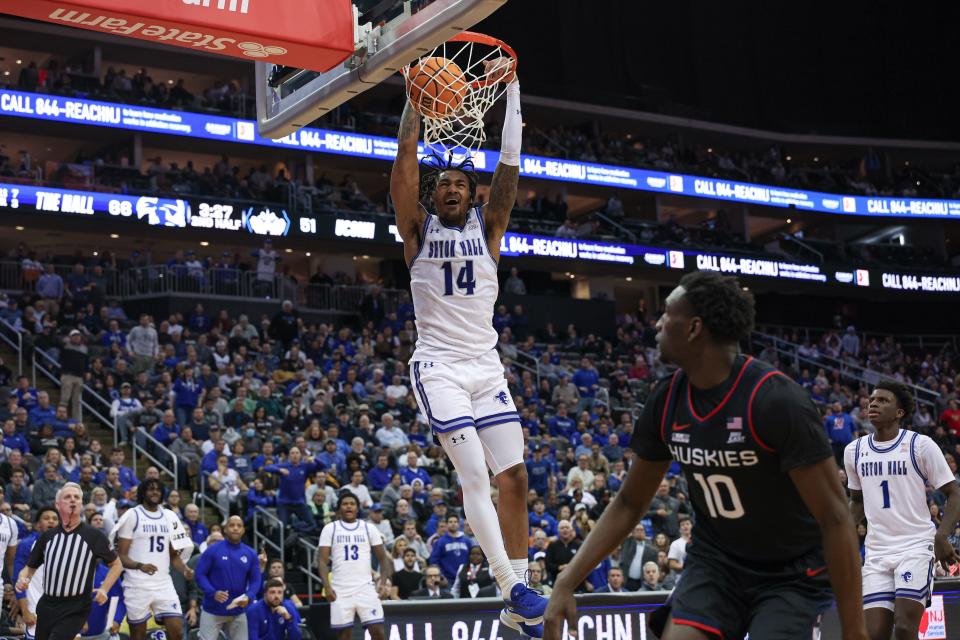 Dec 20, 2023; Newark, New Jersey, USA; Seton Hall Pirates guard Dre Davis (14) dunks the ball during the second half against the Connecticut Huskies at Prudential Center. Mandatory Credit: Vincent Carchietta-USA TODAY Sports