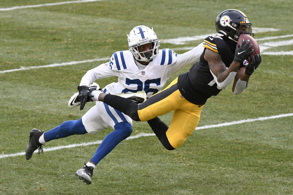 Pittsburgh Steelers wide receiver Diontae Johnson (18) makes a catch past Indianapolis Colts cornerback Rock Ya-Sin (26) for a touchdown during the second half of an NFL football game, Sunday, Dec. 27, 2020, in Pittsburgh. (AP Photo/Don Wright)