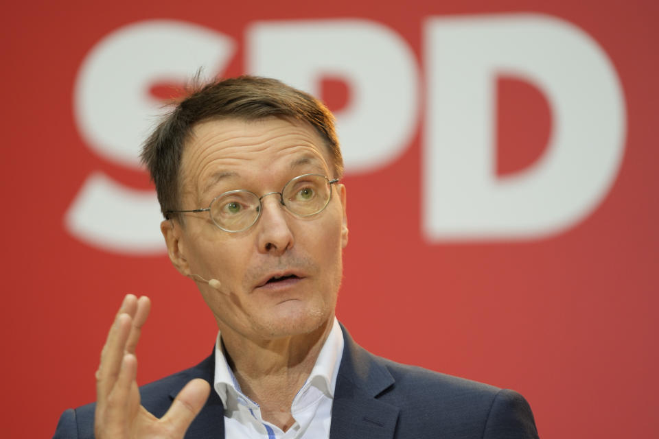 FILE - Designated new German Health Minister Karl Lauterbach of the Social Democratic Party, SPD, speaks during a news conference at the party's headquarters in Berlin, Germany, Dec. 6, 2021. German parliament Bundestag is planning to elect Olaf Scholz of the SPD as new chancellor on Wednesday Dec. 8, 2021. (AP Photo/Markus Schreiber, File)