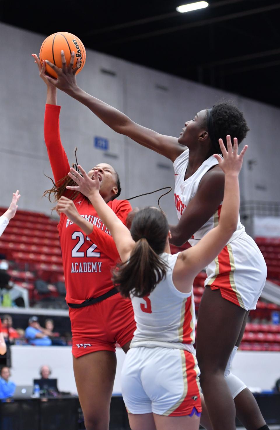 Jordyn Byrd, who won the Florida Gatorade Volleyball Player of the Year, also was a basketball player for the Cougars. Byrd (#45) blocks a shot attempt by Westminster Academy forward Taelyn Carey (#22). Cardinal Mooney High was defeated by Westminster Academy on Friday, Feb. 25, 2022 in the Class 3A championship game in the girls state basketball tournament in Lakeland.