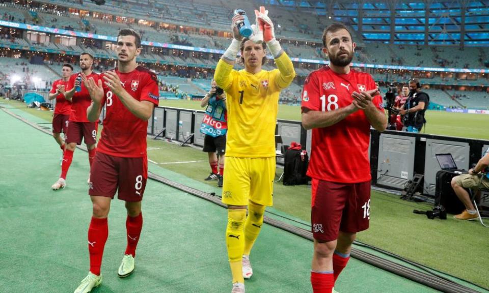 From left: Switzerland’s Remo Freuler, Yann Sommer and Admir Mehmedi applaud their fans after the 3-1 win in Baku against Turkey.
