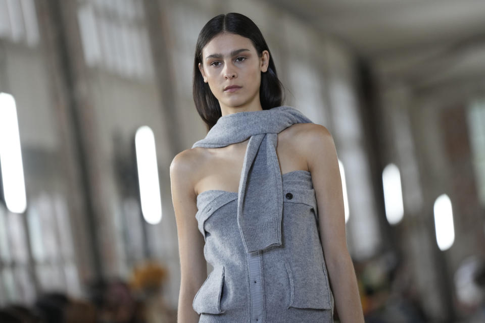 A model wears a creation for Botter for the ready-to-wear Spring/Summer 2023 fashion collection presented Tuesday, Sept. 27, 2022 in Paris. (AP Photo/Francois Mori)