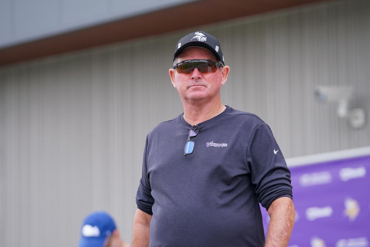 Minnesota Vikings head coach Mike Zimmer takes the field at training camp at TCO Performance Center.