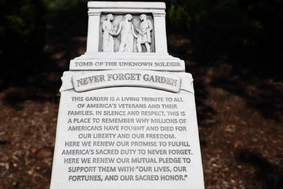 Plaque: “Tomb of the Unknown Soldier Never Forget Garden”