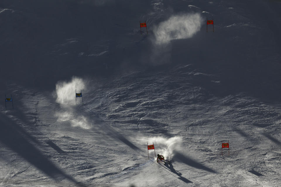 Switzerland's Lara Gut Behrami speeds down the course on her way to win an alpine ski, women's World Cup giant slalom race, in Soelden, Austria, Saturday, Oct. 28, 2023. (AP Photo/Alessandro Trovati)