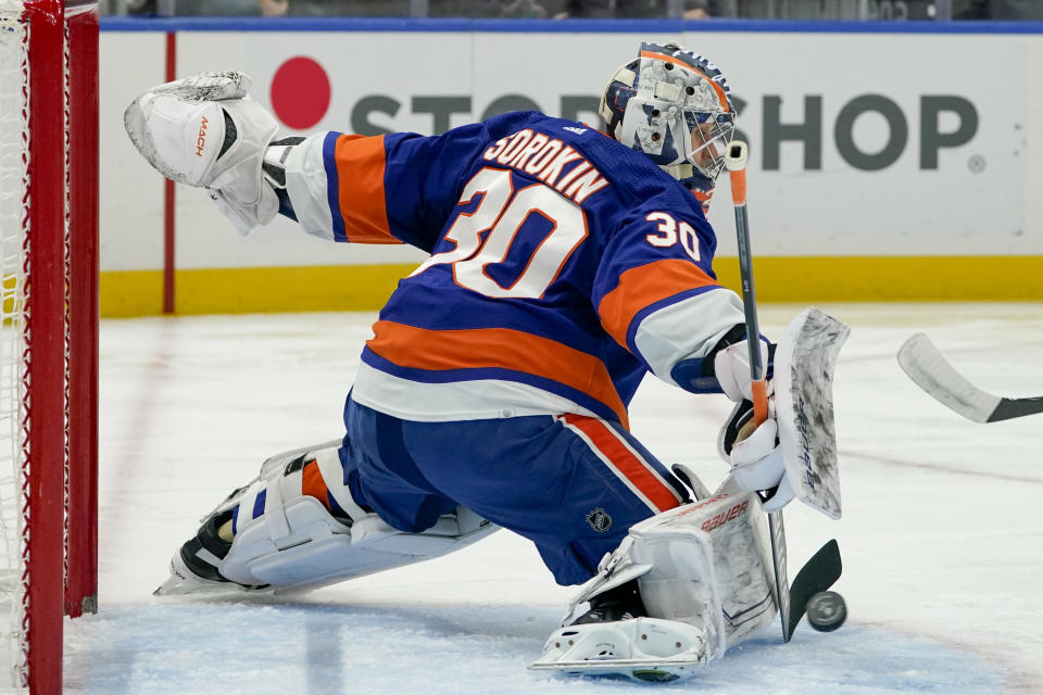 New York Islanders goaltender Ilya Sorokin (30) makes a save in the first period of an NHL hockey game against the New York Rangers, Wednesday, Oct. 26, 2022, in Elmont, N.Y. (AP Photo/John Minchillo)