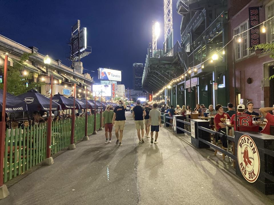 Fans stroll down a not-that-packed street outside Fenway Park. (Yahoo Sports)