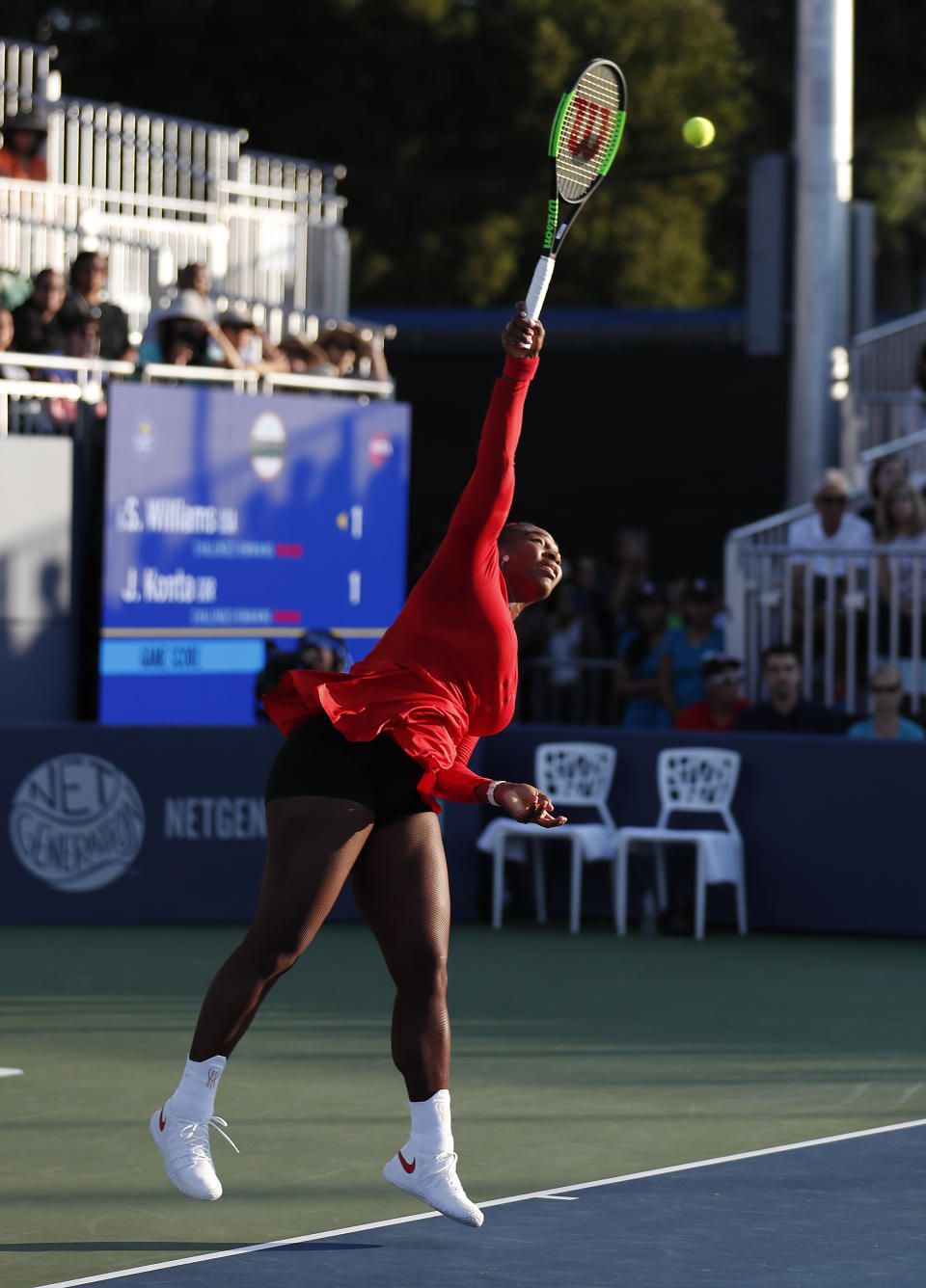 Serena Williams, of the United States, serves to Johanna Konta, from Britain, during the Mubadala Silicon Valley Classic tennis tournament in San Jose, Calif., Tuesday, July 31, 2018. Konta won 6-1, 6-0. (AP Photo/Tony Avelar)