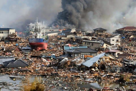 The magnitude 9 earthquake triggered a huge natural disaster - Credit: EPA