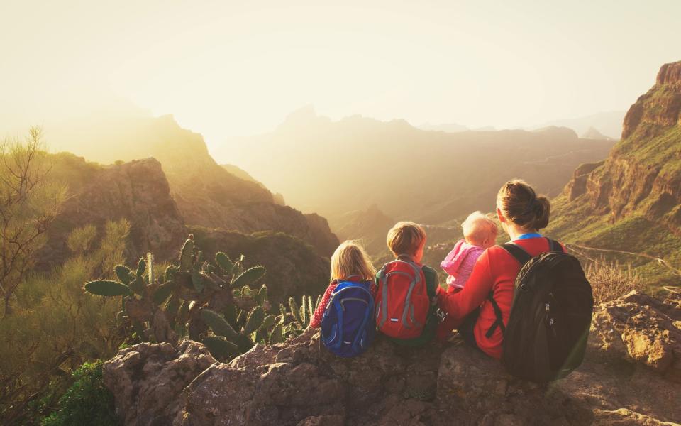 Taking a child on a backpacking trip can advance their cognitive development - iStock