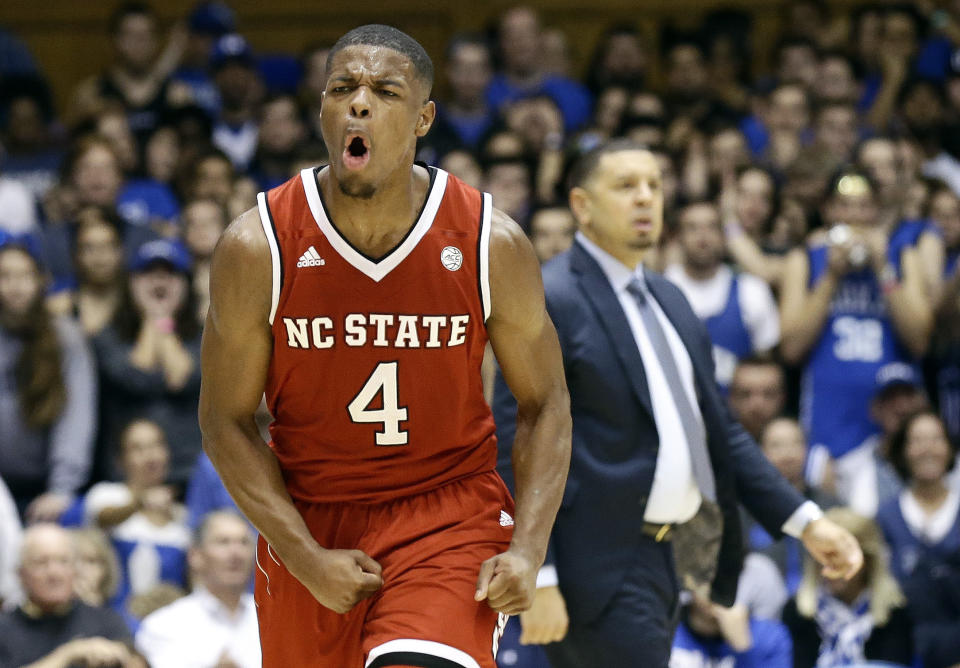 N.C. State's Dennis Smith Jr. (4) reacts following a basket against Duke during the second half of an NCAA college basketball game in Durham, N.C., Monday, Jan. 23, 2017. North Carolina State won 84-82. (AP Photo/Gerry Broome)