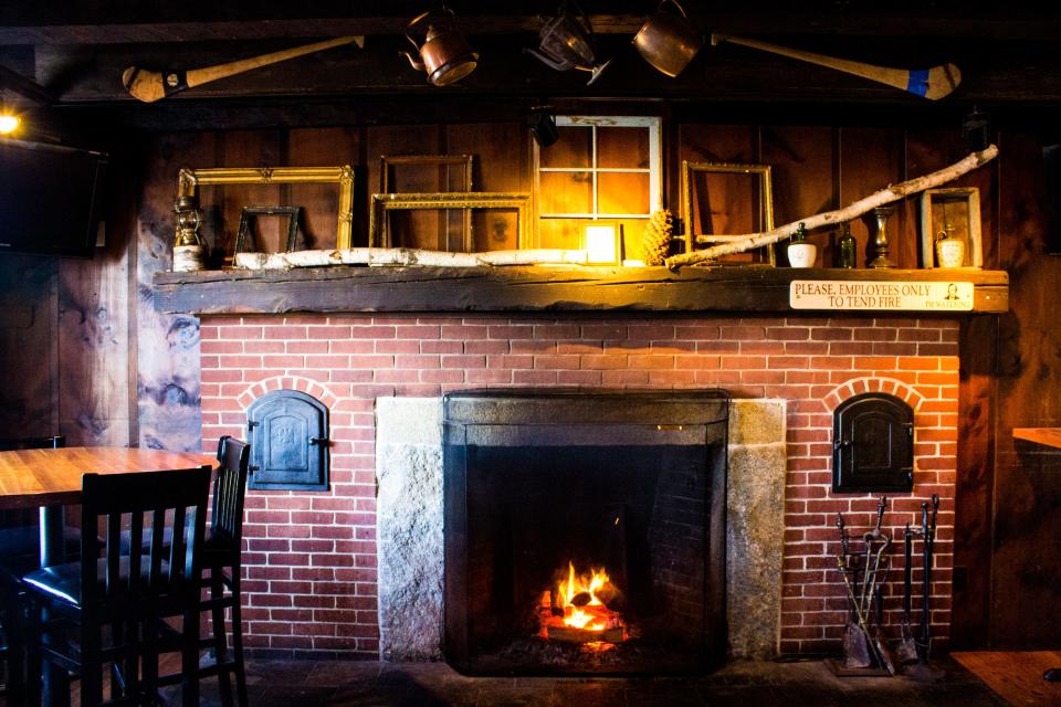 At Stone's Public House in Ashland, the woodburning fireplace is the centerpiece of the lounge area, and there are two gas fireplaces in the dining rooms.