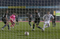 Leeds United's Rodrigo right, scores his side's first goal during the English Premier League soccer match between Leeds United and Manchester City at Elland Road in Leeds, England, Saturday, Oct. 3, 2020. (Jason Cairnduff/Pool via AP)