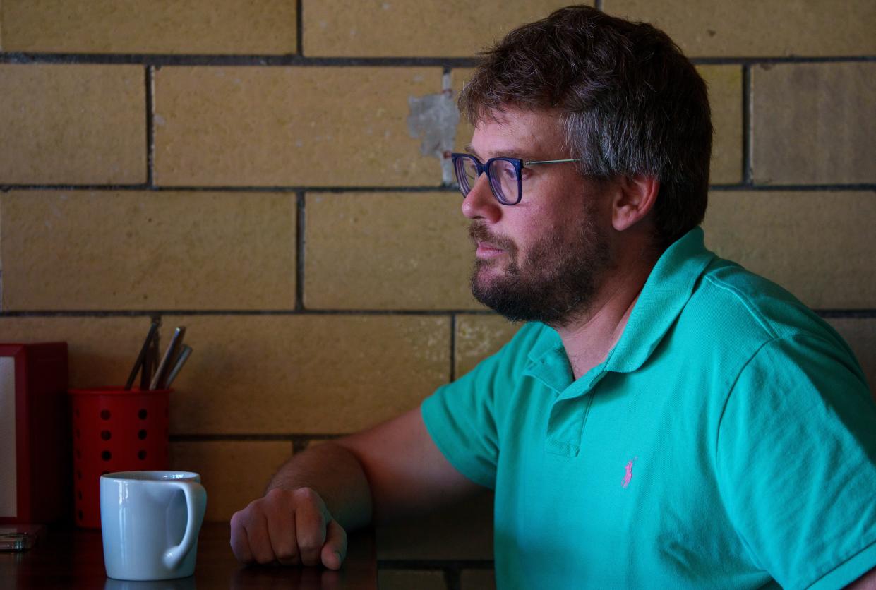 Author John Green speaks Tuesday, Aug. 29, 2023, with IndyStar at Chalet coffee shop about a recent Hamilton East Public Library decision to remove books from their teen section shelves after a new policy targeting books deemed not "age appropriate."