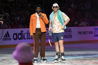 Florida Panthers' Matthew Tkachuk, right participates in a skit during the NHL All Star Skills Showcase, Friday, Feb. 3, 2023, in Sunrise, Fla. (AP Photo/Lynne Sladky)