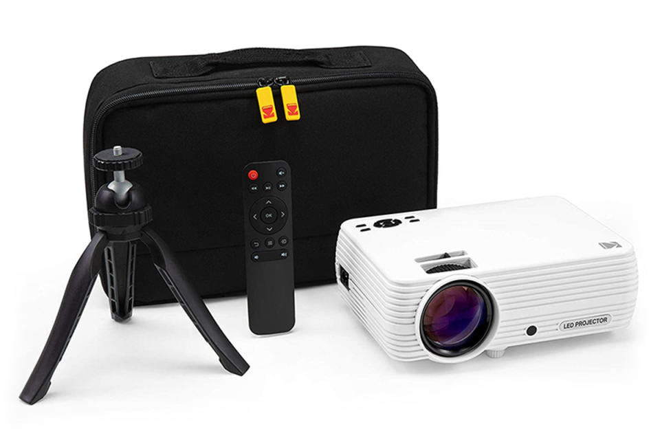 Kodak projector with case, remote, and tripod