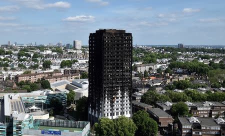 Extensive damage is seen to the Grenfell Tower block which was destroyed in a disastrous fire, in north Kensington, West London, Britain June 16, 2017. REUTERS/Hannah McKay